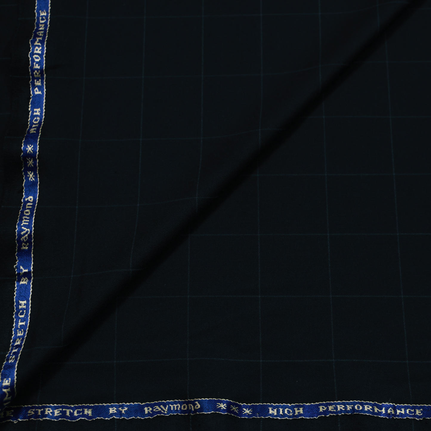 RAYMOND PRIME STRETCH BLACK CHECKS SUITING