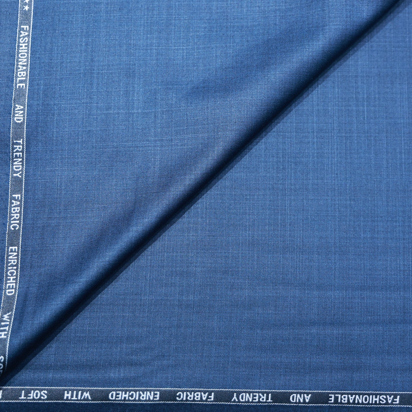 RAYMOND TAURAS BLUE SELF SUITING