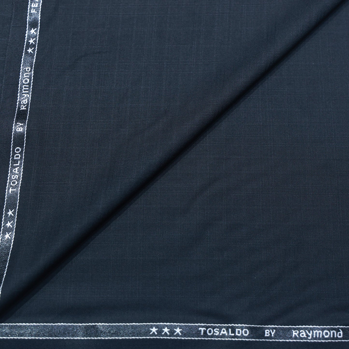 RAYMOND TOSALDO BLACK SELF SUITING