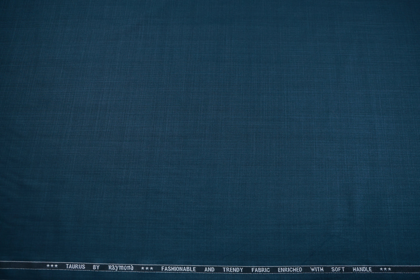 RAYMOND TAURUS TEAL SELF SUITING