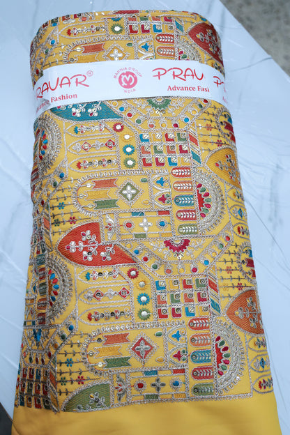 Yellow; embroidered fabric with intricate, colorfull patterns