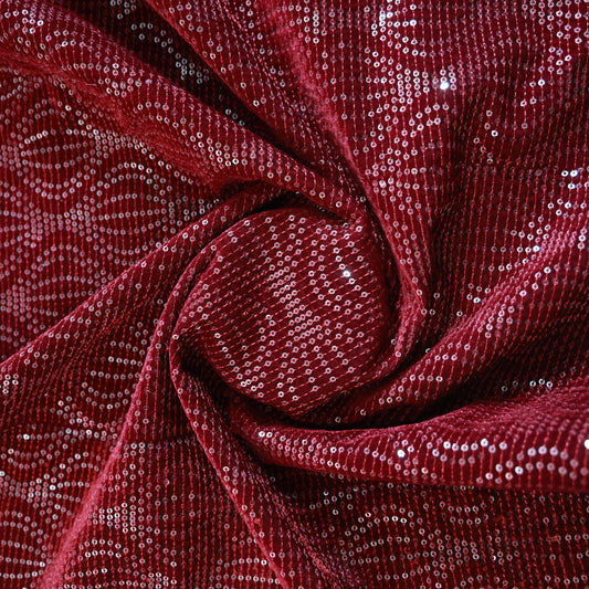red sequin velvet with a textured pattern