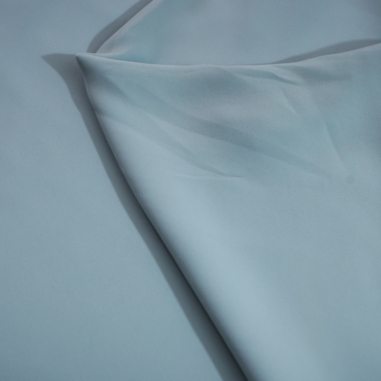ABSOLUTO JAPANESE LYCRA SEA GREEN SUITING