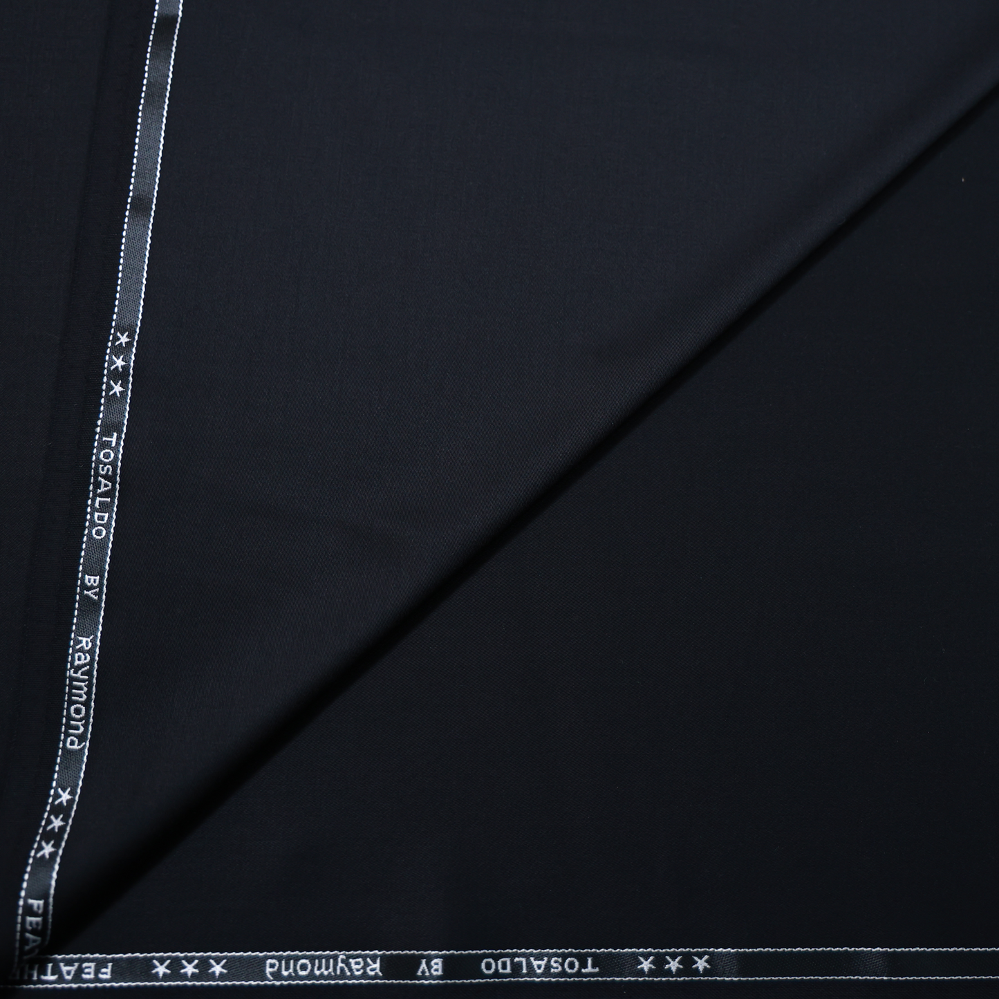RAYMOND TOSALDO BLACK SUITING