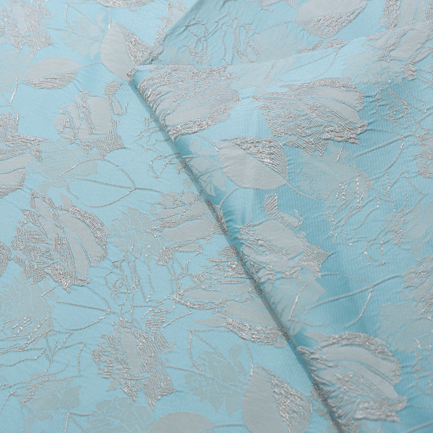 EMBOSED LIGHT TURQOISE FABRIC